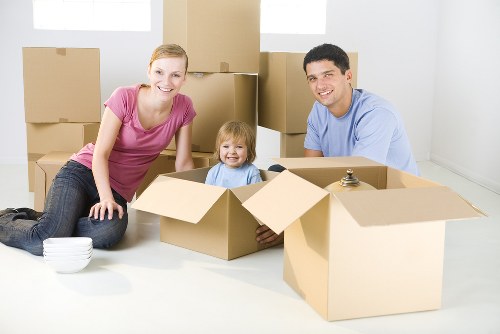 Professional flat removals in Bow with packed boxes ready for transport