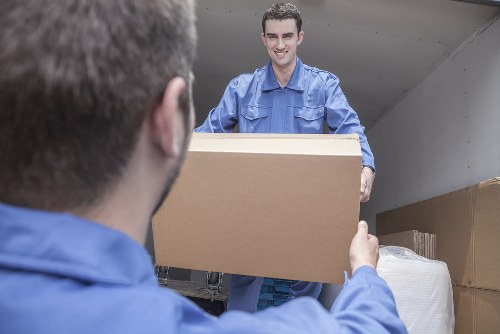 Removal team pricing a clearance job in Bow