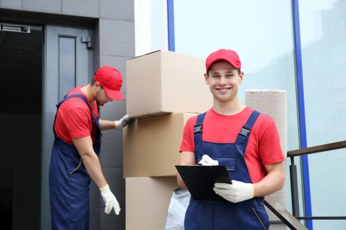 Removal van and movers preparing for a quick relocation in Bow
