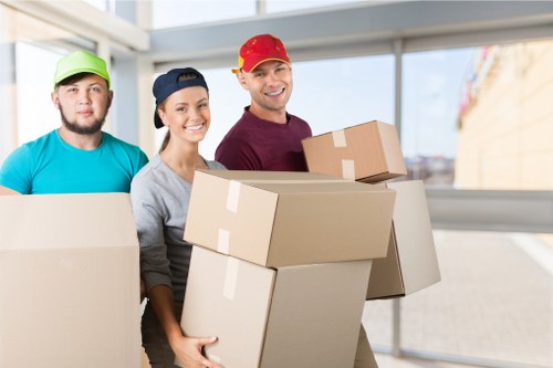 Moving team navigating access challenges in Bow flats and houses