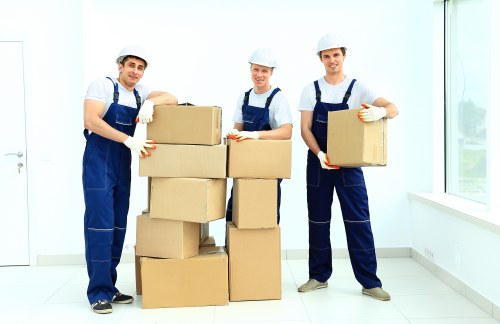Local Bow movers handling furniture with care