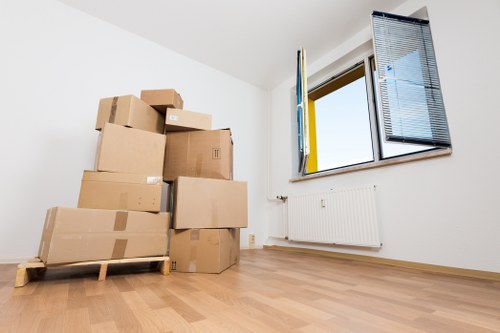 Efficient house removalists in Bow unloading at a new home