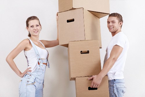 Professional man and van moving items in Bow