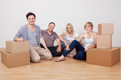 Packed moving boxes and home relocation preparation in Bow
