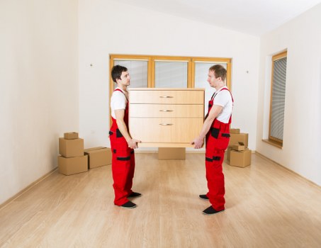 Office movers coordinating transport and unloading for a Bow business move